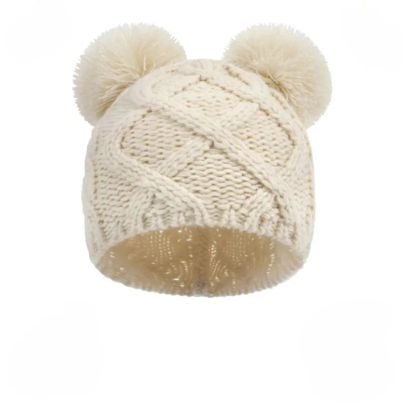 Bonnet bébé crème en tricot doux avec pompons | Bonnet d’hiver élégant pour nouveau-né