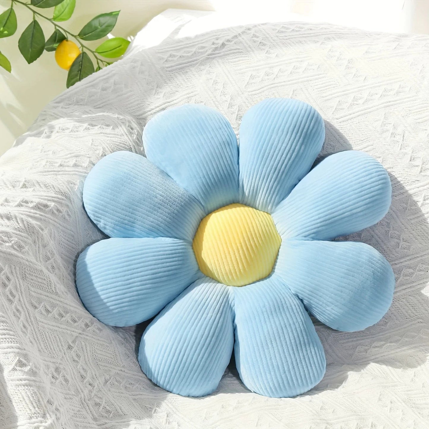 Coussin en forme de marguerite bleu