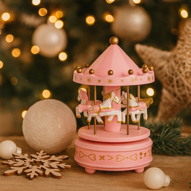Carrousel rose lumineux décoré pour Noël, ambiance chaleureuse et festive pour chambre d’enfant.