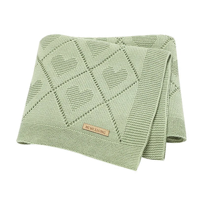 Couverture bébé en tricot verte avec motifs cœur, douce et confortable