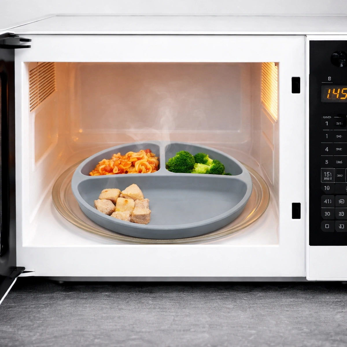 assiette bébé silicone compartimentée compatible micro-onde chauffage repas bébé sécurisé