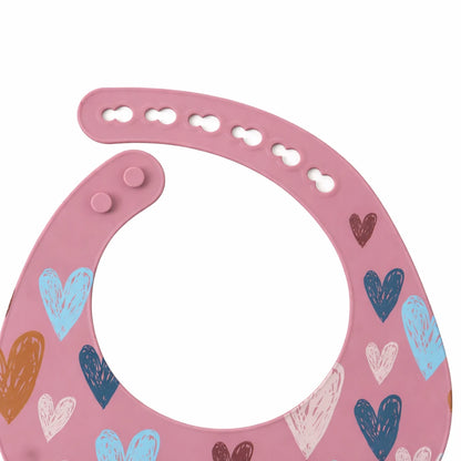 Bavette de bébé en silicone rose réglable