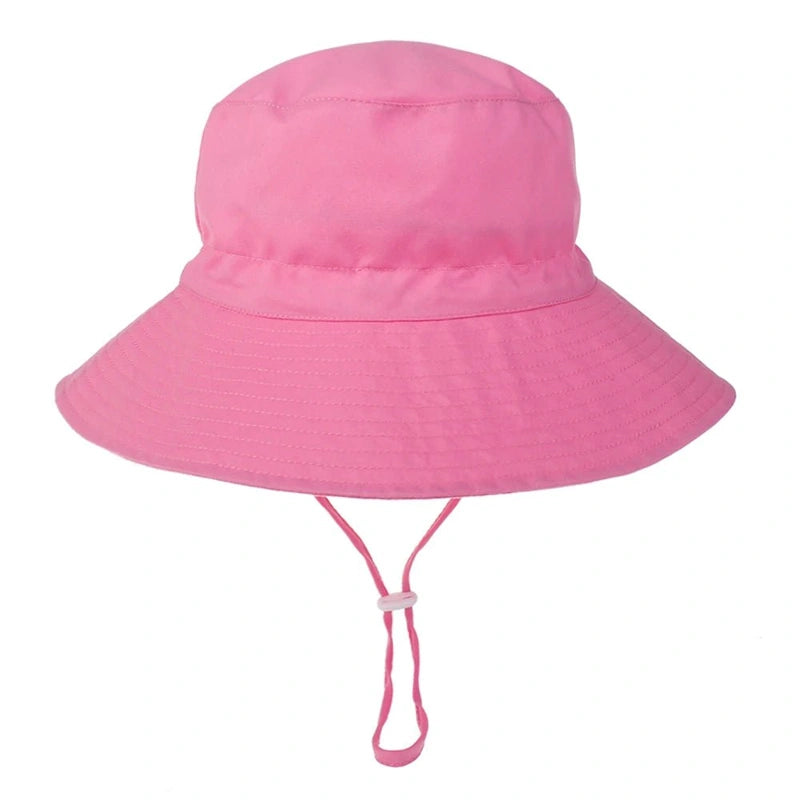 Chapeau bébé rose uni – accessoire doux et confortable pour fille