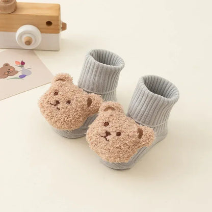 Chaussettes bébé en coton gris avec tête d’ours peluche