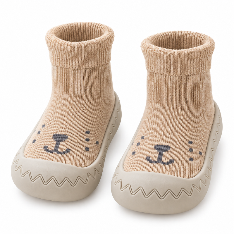 Chaussons bébé beiges en maille douce avec semelle antidérapante