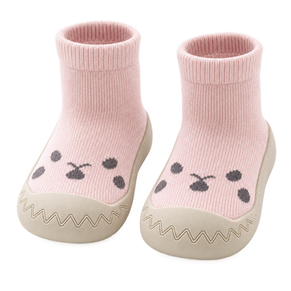 Chaussons bébé roses en maille douce avec semelle antidérapante