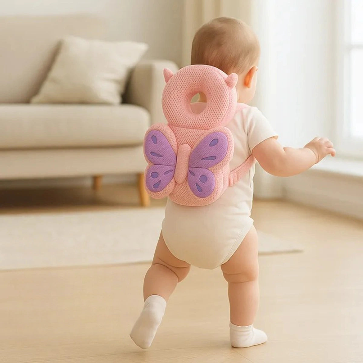 Bébé qui marche avec coussin anti chute papillon rose pour protection de la tête et du dos