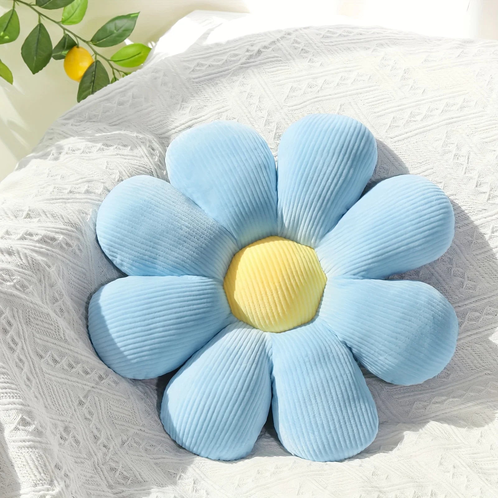 Coussin en forme de marguerite bleu