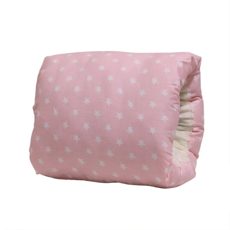 Coussin d’allaitement bébé rose motif étoiles douceur et confort