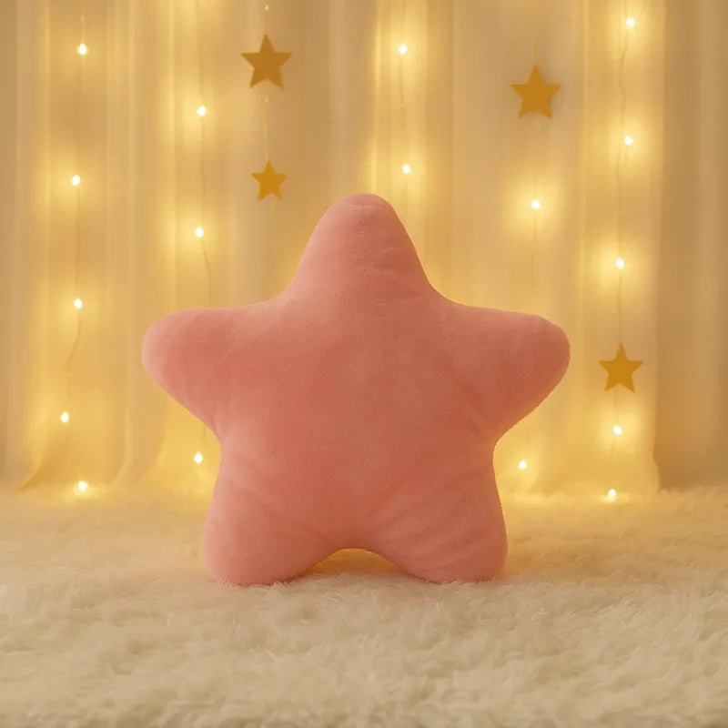 Coussin en forme d'étoile rose