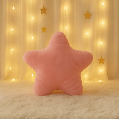 Coussin en forme d'étoile rose