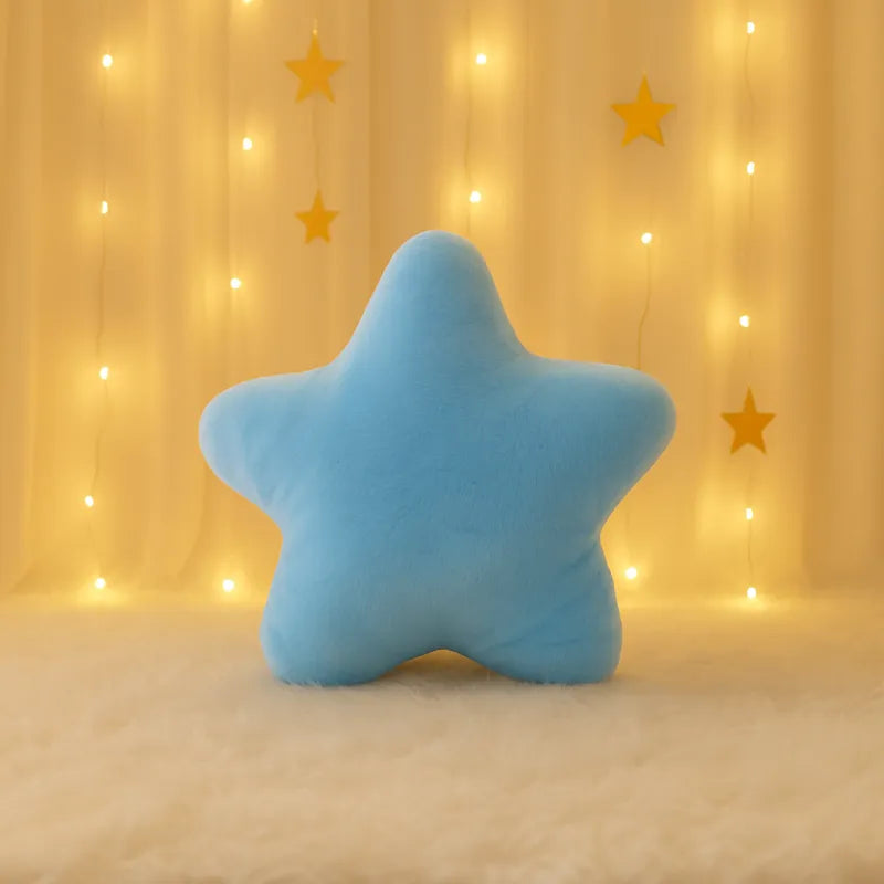 Coussin en forme d'étoile bleu 