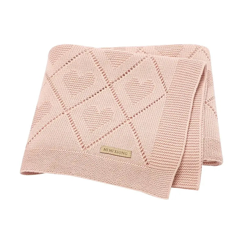 Couverture bébé en tricot rose avec motifs cœur, douce et confortable