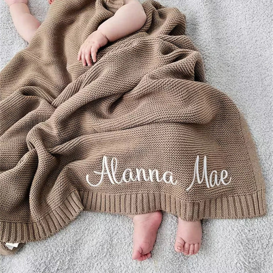Couverture en tricot - Cigogne et bébé