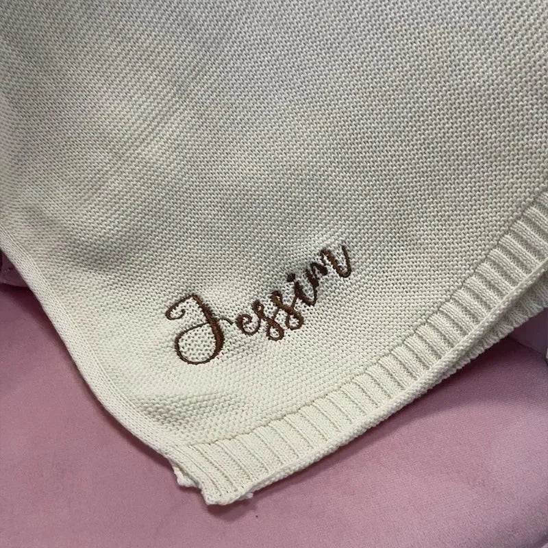 Couverture en tricot - Cigogne et bébé