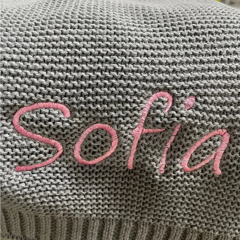 Couverture en tricot - Cigogne et bébé