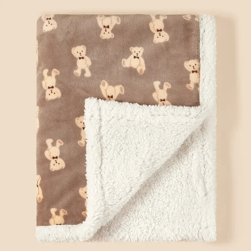 Couverture bébé douce motif oursons crème sur fond brun