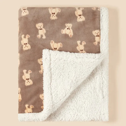 Couverture bébé douce motif oursons crème sur fond brun