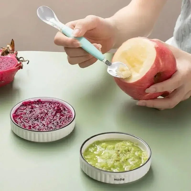 Cuillère à fruit évolutive pour bébé - Cigogne et bébé