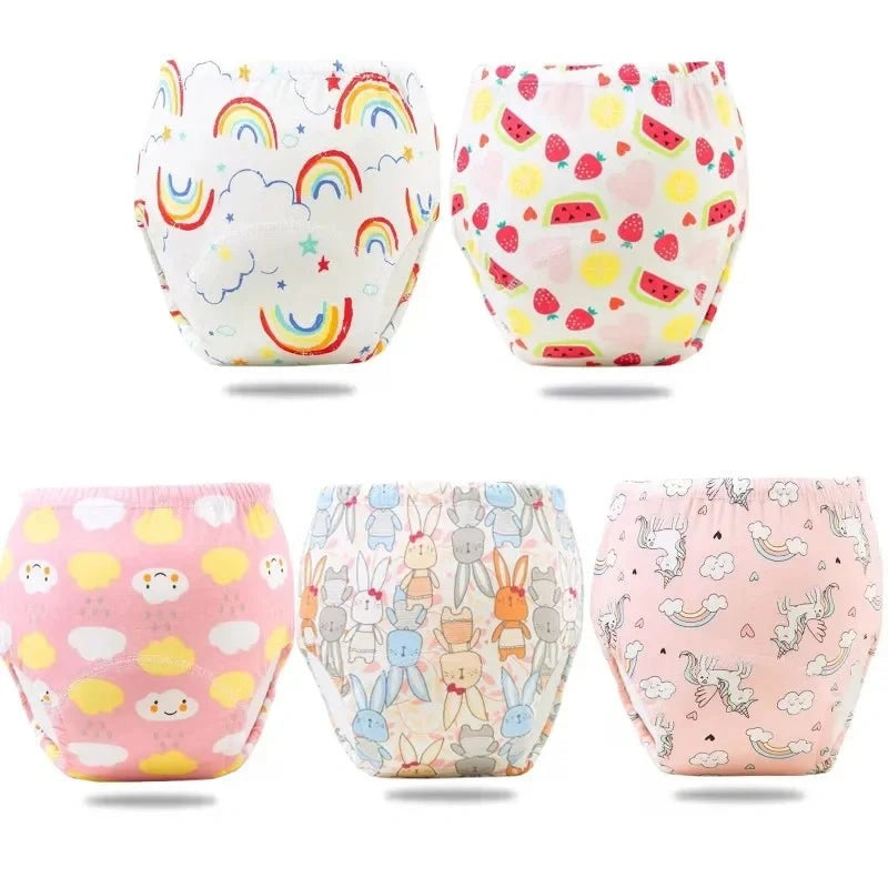 Culotte d’apprentissage bébé design arc-en-ciel et licorne douce