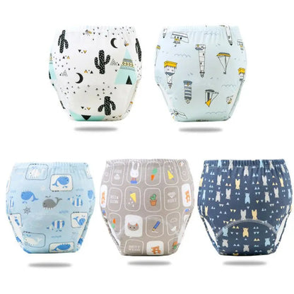 Cinq culottes d’apprentissage lavables pour bébé avec motifs cactus, montgolfières, baleines et lapins.