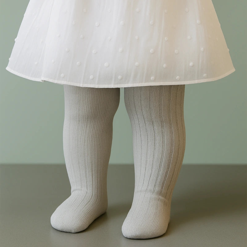Collant bébé gris doux et extensible pour toutes saisons
