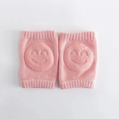 Genouillère bébé rose antidérapante avec sourire pour apprentissage marche