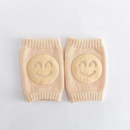 Genouillère bébé beige antidérapante sourire offrant confort et sécurité