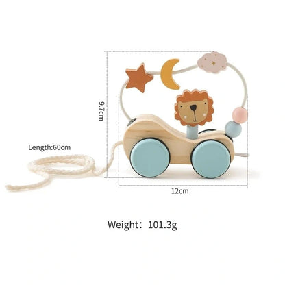Jouet à tirer en bois lion avec perles colorées et motifs étoiles et lune pour bébé.