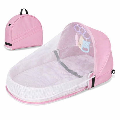 Lit bébé compact rose avec sac de transport