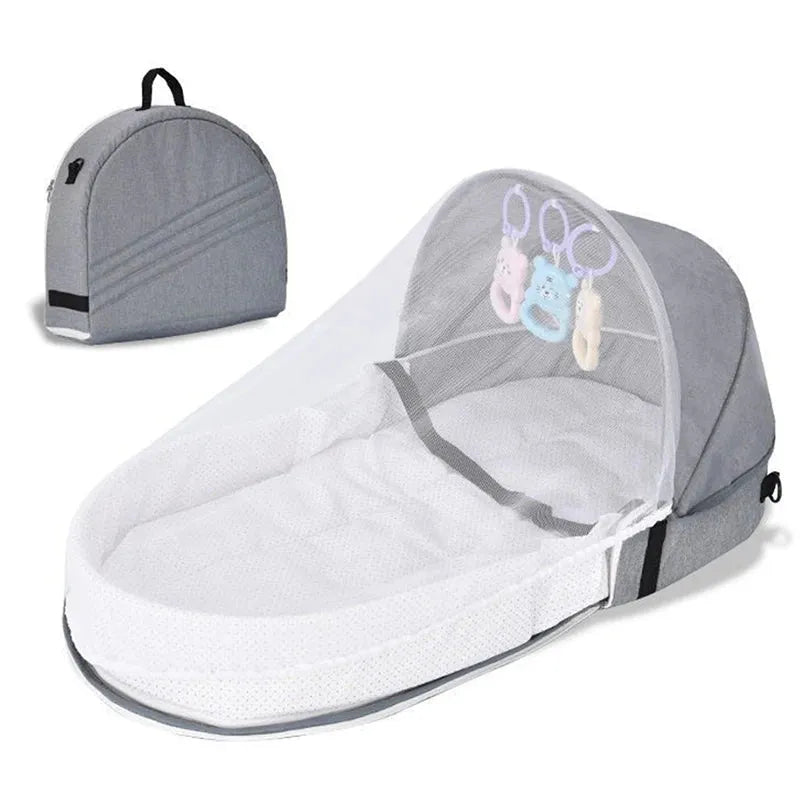 Lit bébé voyage pliable gris moderne et facile à transporter