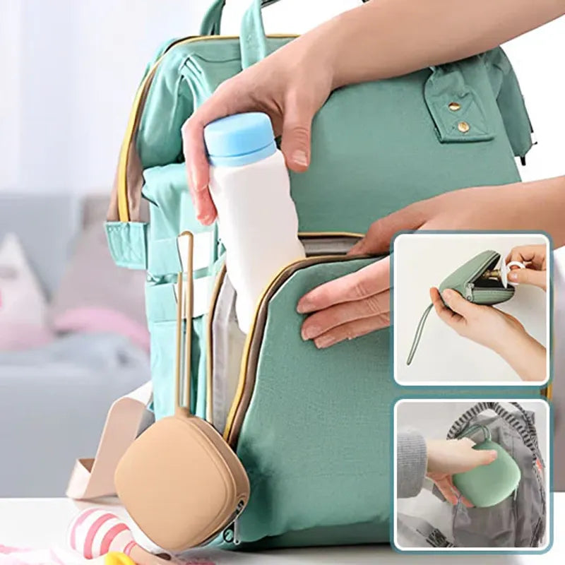 Porte sucette bébé voyage compact accroché au sac