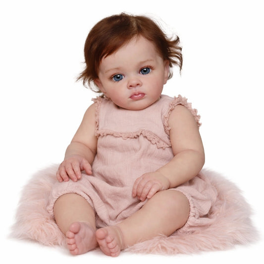 poupée reborn réaliste 60 cm bébé fille assise fond blanc poupée jouet imitation réaliste