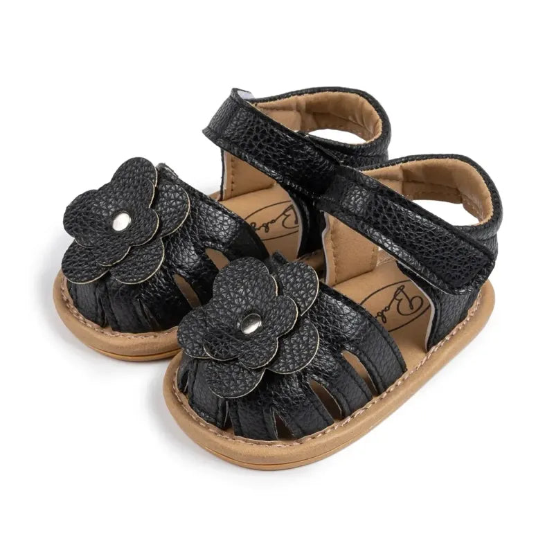 Sandale bébé noire élégante cuir souple fleur confort sécurité