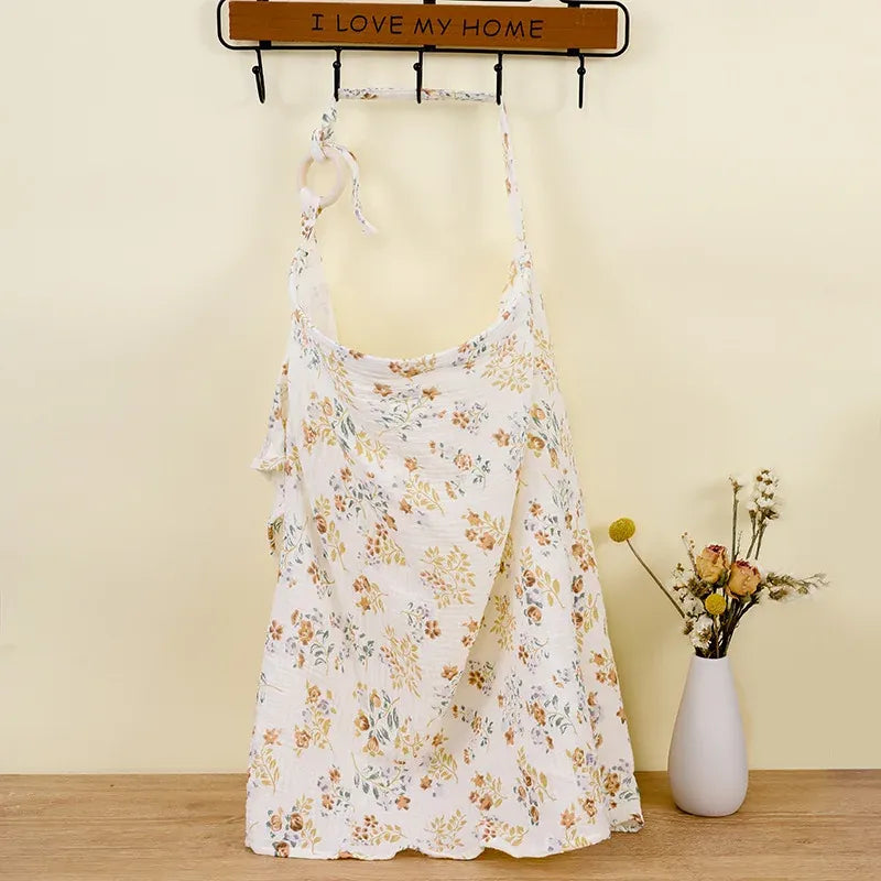 Tablier d’allaitement à fleurs jaunes et vertes motif floral