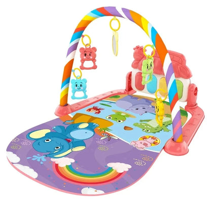 Tapis d’activité musical bébé éléphant rose avec arche multicolore, jouets suspendus et module sonore, tapis d’éveil interactif pour motricité et stimulation sensorielle.