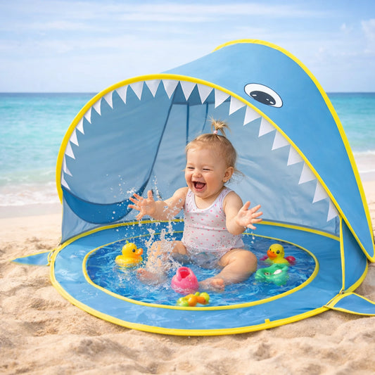 tente de plage bébé anti uv avec piscine intégrée bébé qui joue dans l’eau avec jouets