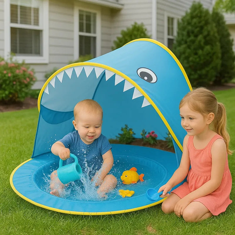 Tente de plage avec bébé et petite fille